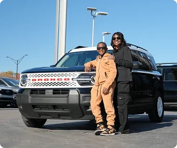 Customers with their Ford truck at Dorian Ford