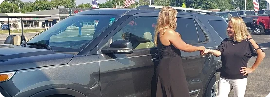 A customer brings her SUV to Dorian Ford for an appraisal
