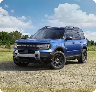 Blue Ford Bronco Sport on a scenic overlook